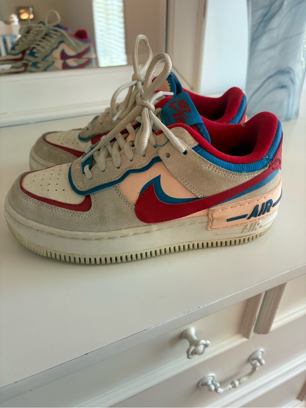 Nike Women's Low-Top Sneakers in Red, Blue, and Cream